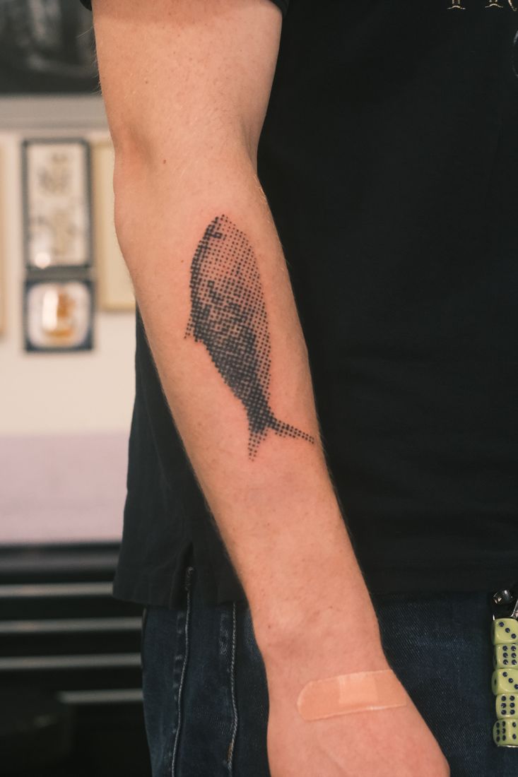 Fineline: Fisch am Unterarm.